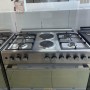 Cuisinière Mixte MAXI F9S42E3, 4 Feux Gaz + 2 Plaques Électriques + Four Électrique en Innox Silver-Grey