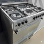 Cuisinière Mixte MAXI F9S42E3, 4 Feux Gaz + 2 Plaques Électriques + Four Électrique en Innox Silver-Grey